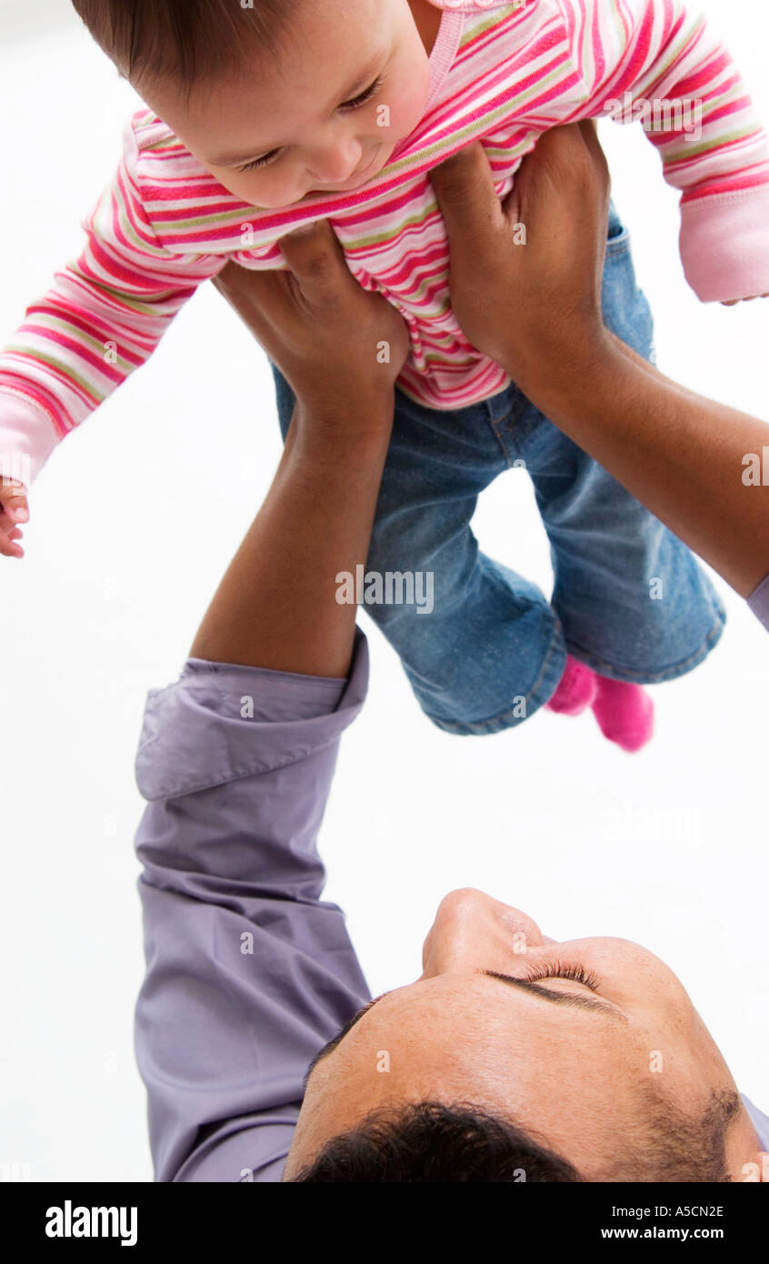 African American father holding daughter Stock Photo - Alamy