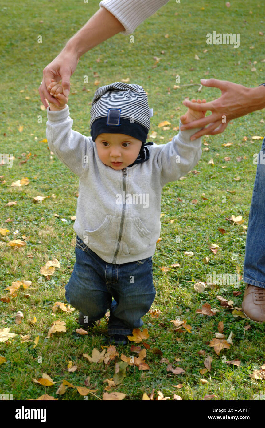 Baby starting to walk hi-res stock photography and images - Alamy