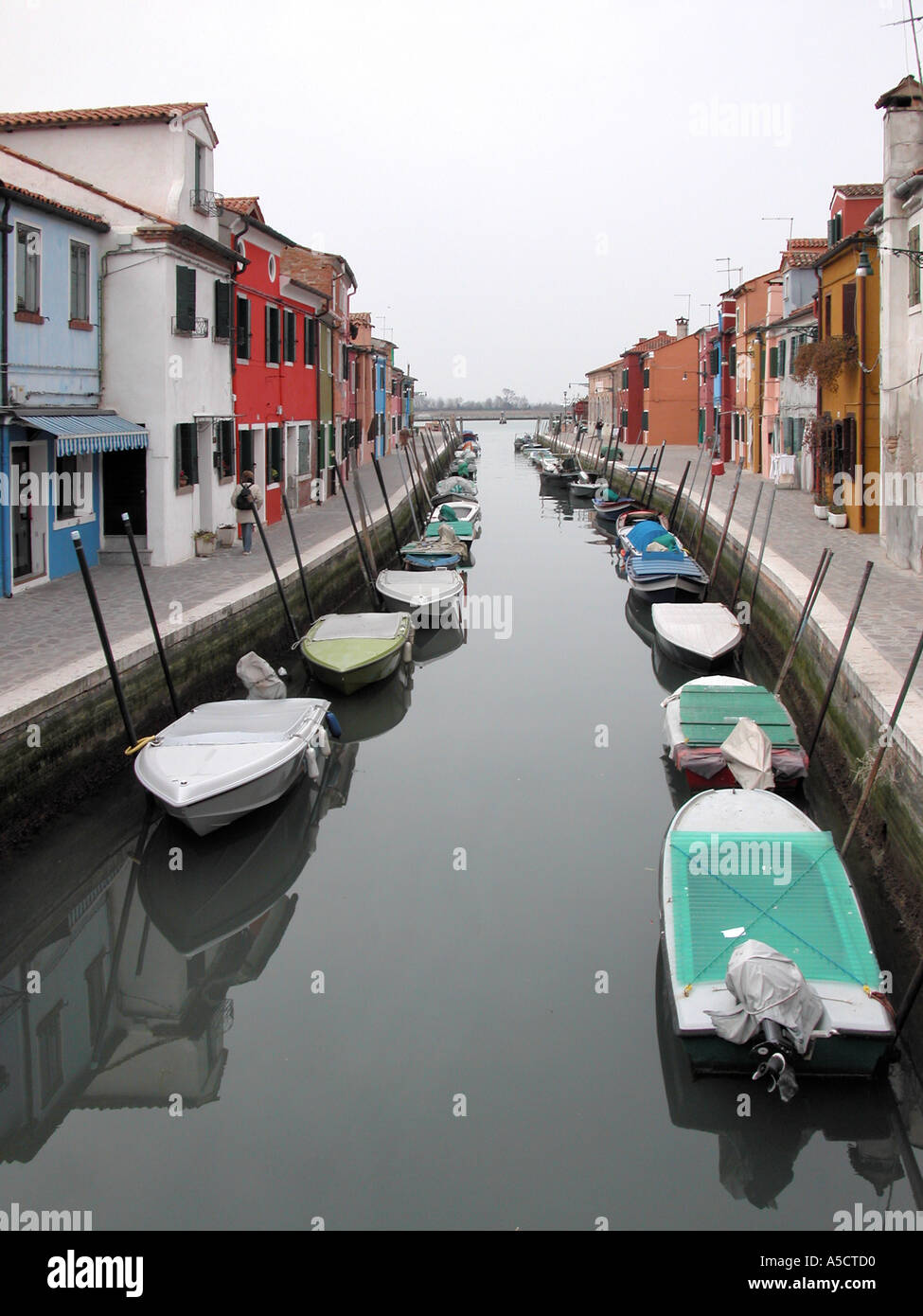 Colourful bright multihued residential houses along canals of Burano Island Venice Venezia Veneto Italy Europe EU Mediterranean Stock Photo