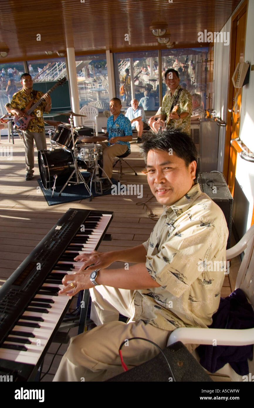 Piano player and band on the Holland America cruise ship ms Veendam Stock  Photo - Alamy