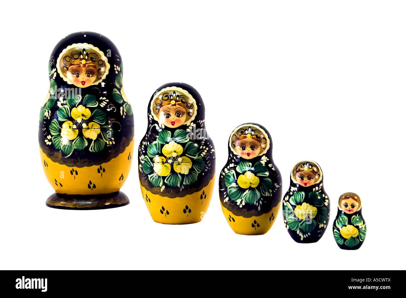 Five Russian dolls in sequence isolated on white. Stock Photo