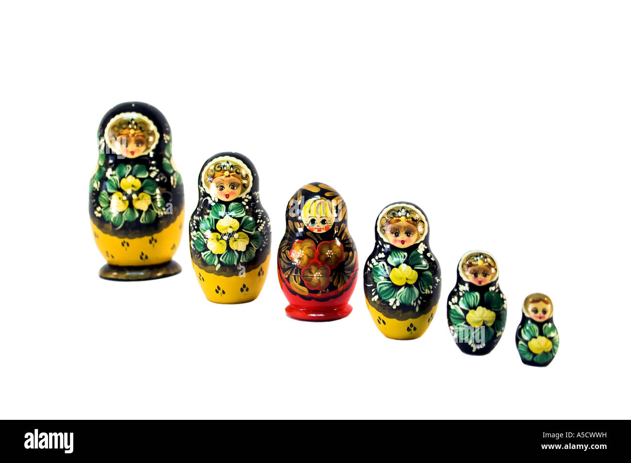 Six Russian dolls in sequence isolated on white with a outsider Stock Photo