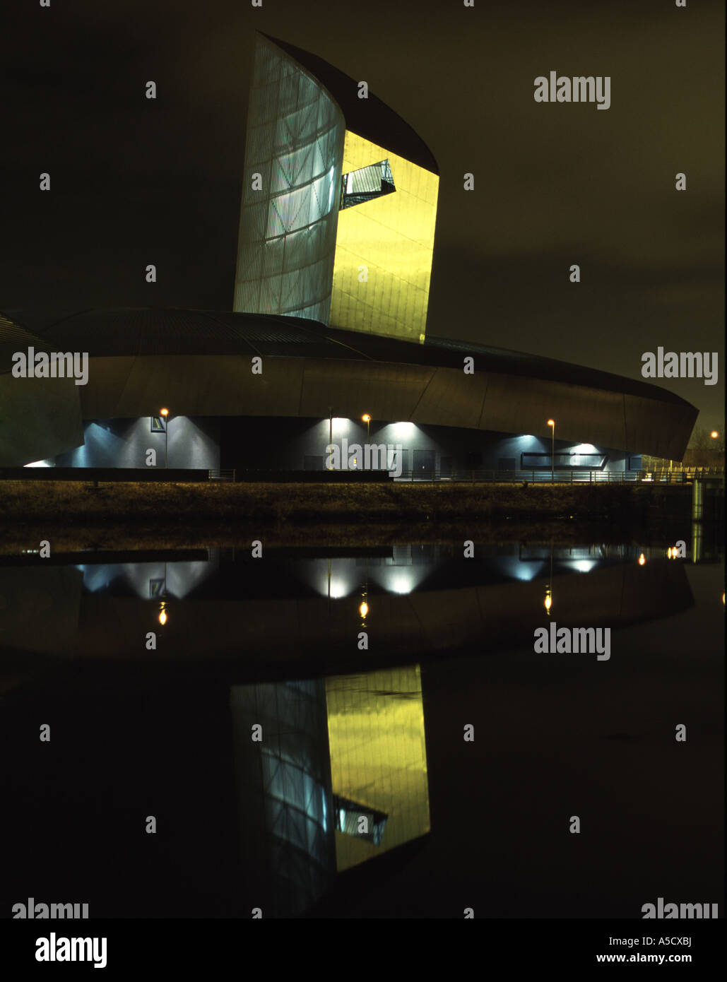 The Imperial War Museum North at night. Salford Quays, UK Stock Photo ...