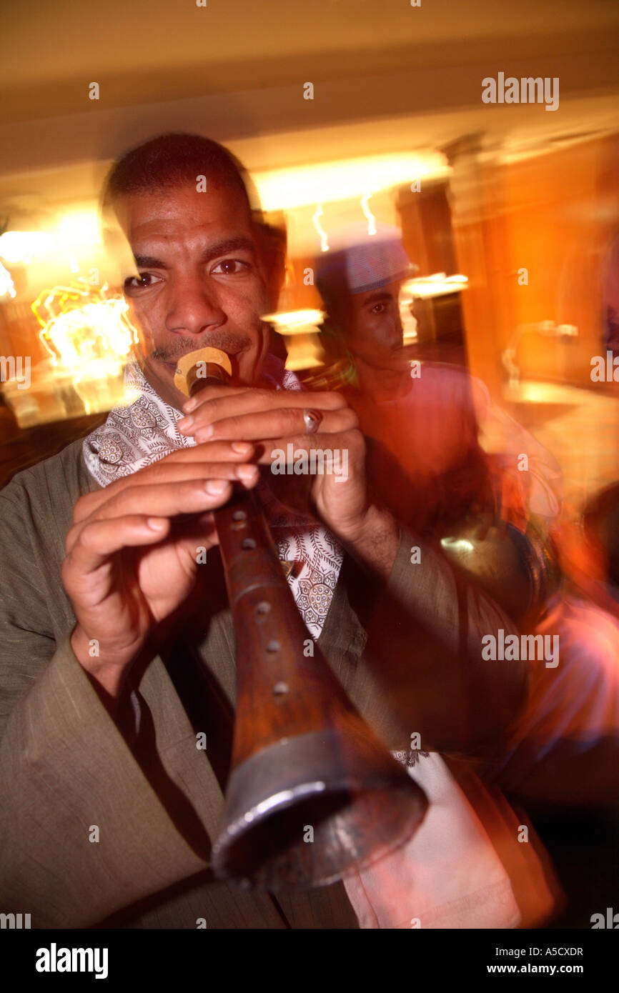 Egyptian musician playing a flute Stock Photo Alamy