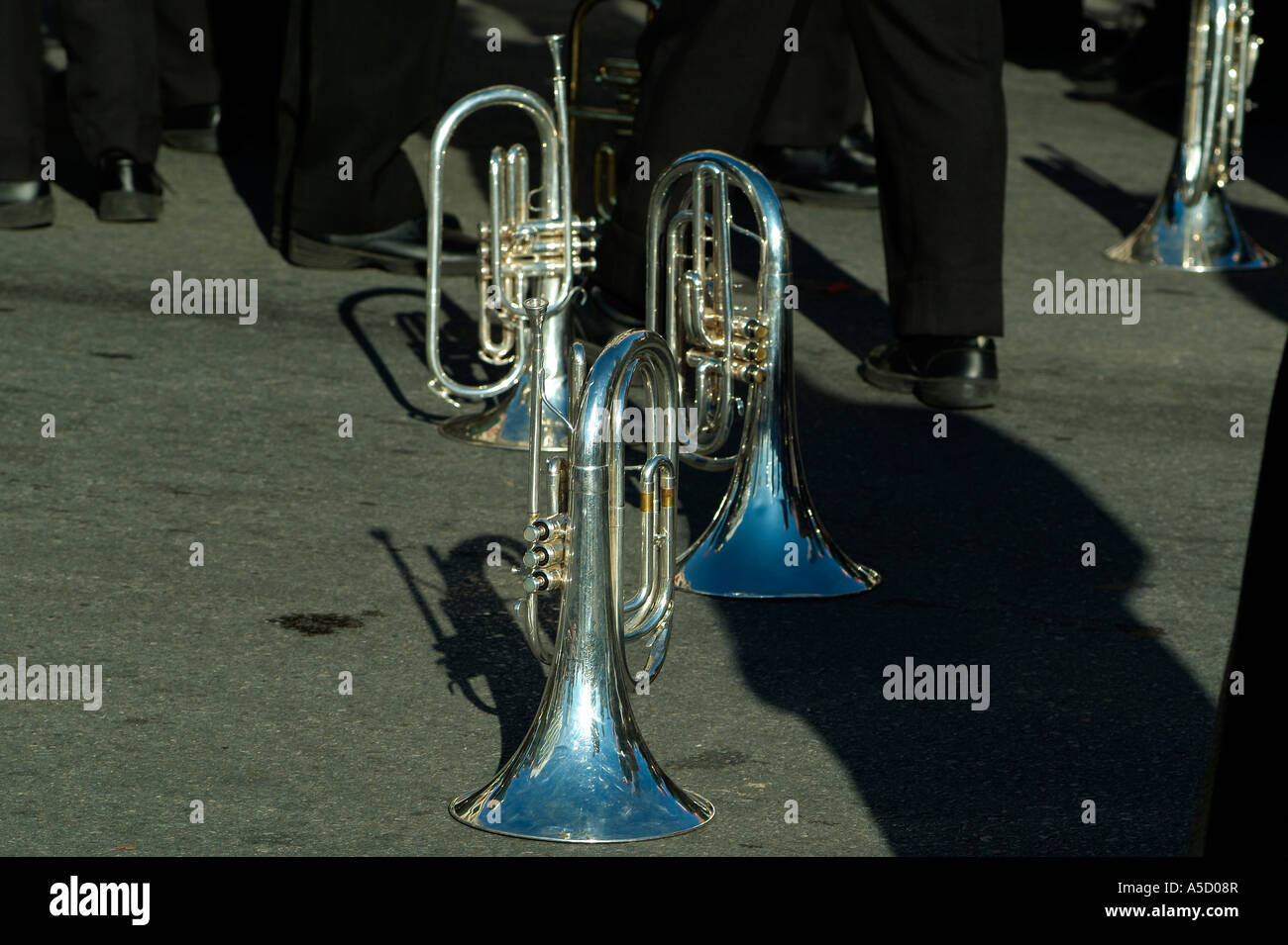 Trumpet laying down on a sidewalk of a street Stock Photo - Alamy