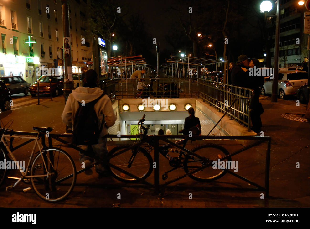 Paris Metro entry at night Stock Photo - Alamy