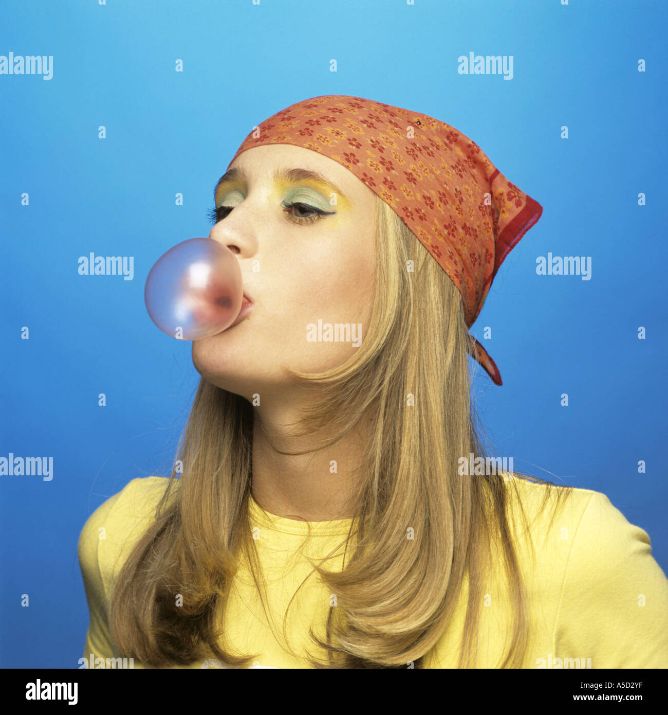 Teenage girl eating bubble gum Stock Photo Alamy