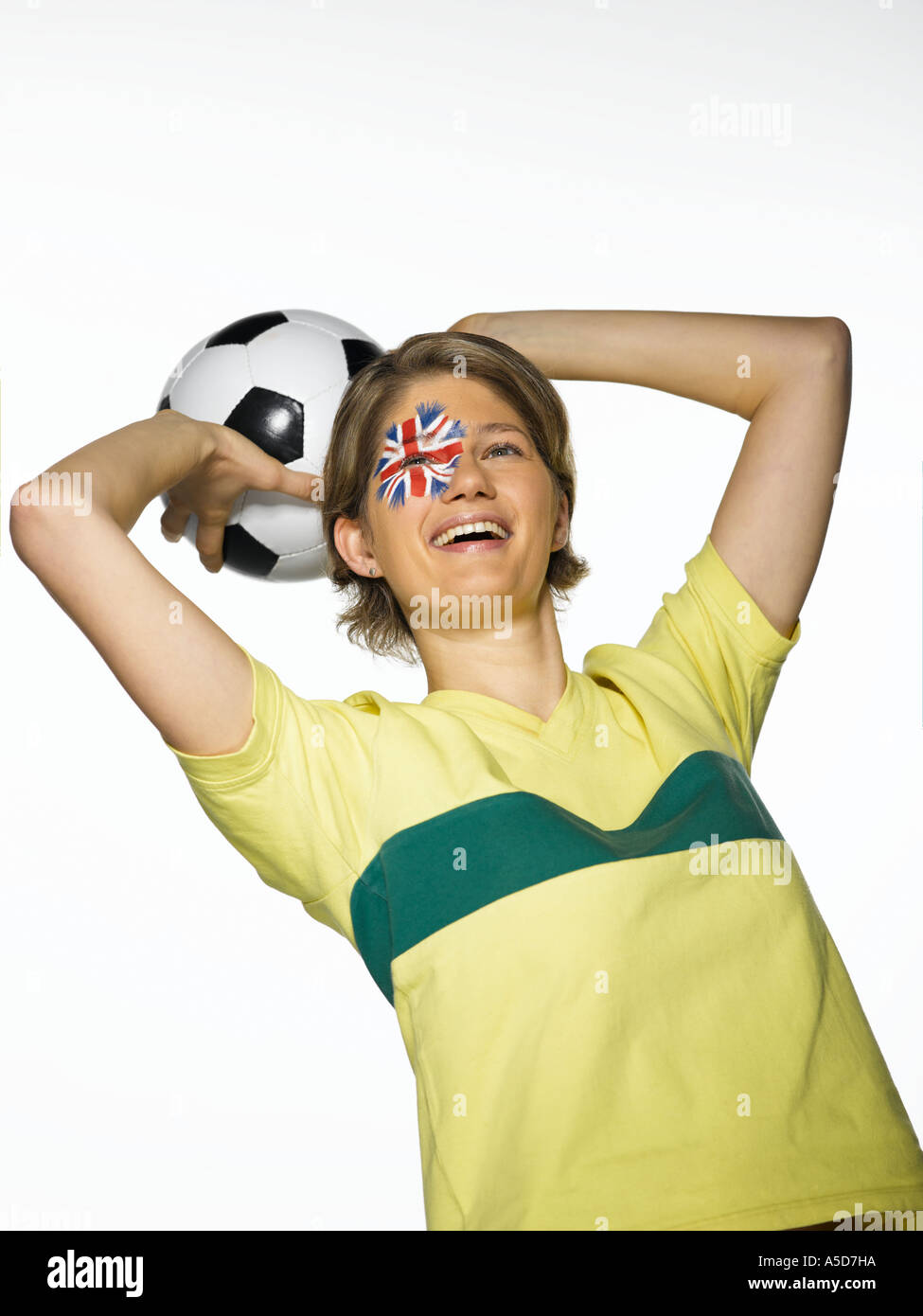 Australian female football fan holding football Stock Photo