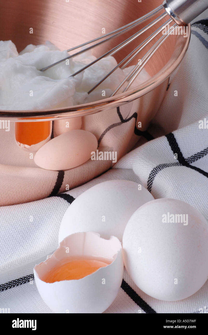 Eggs and whisked egg white Stock Photo Alamy