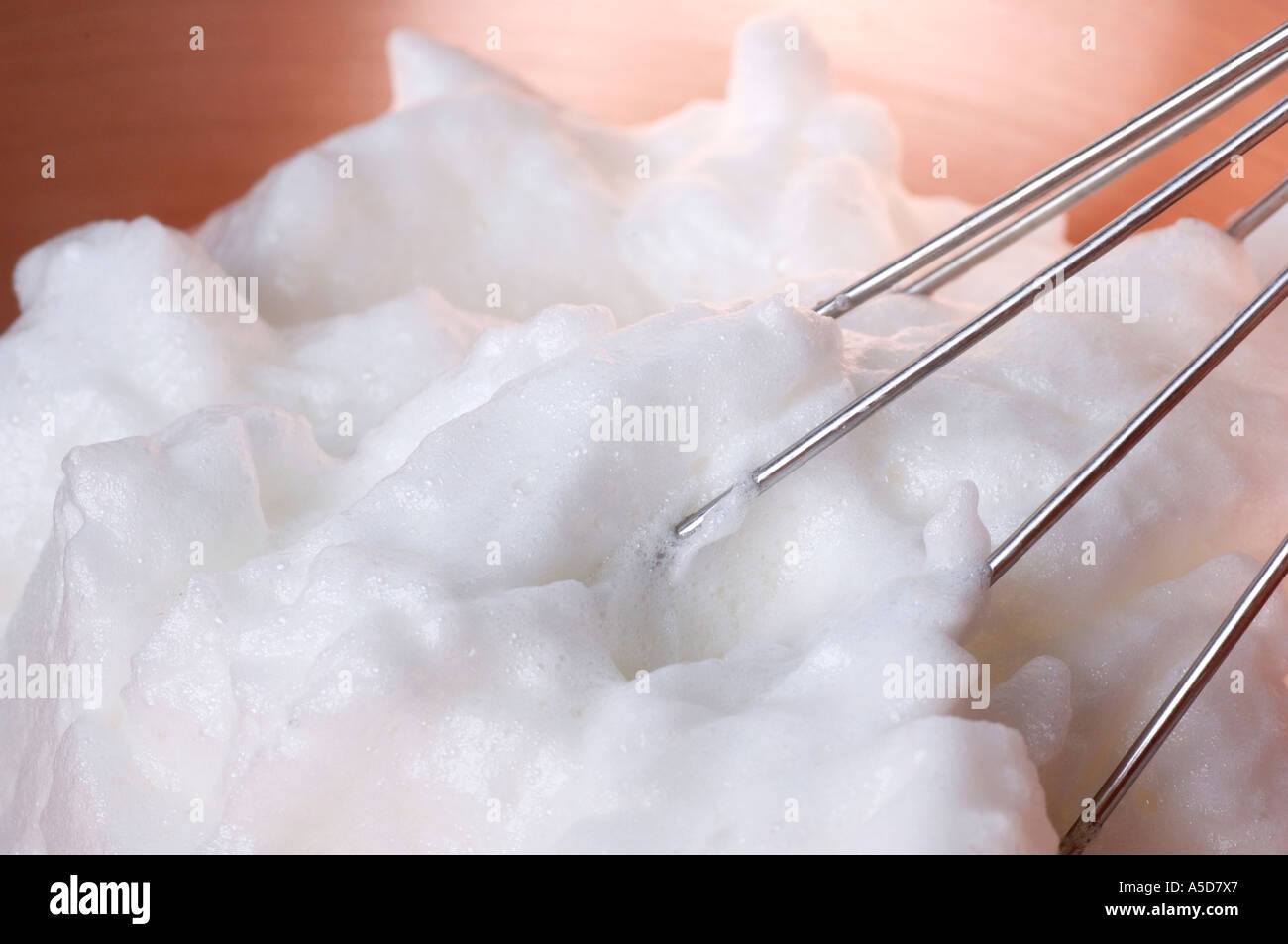 Whisked egg white, closeup Stock Photo Alamy