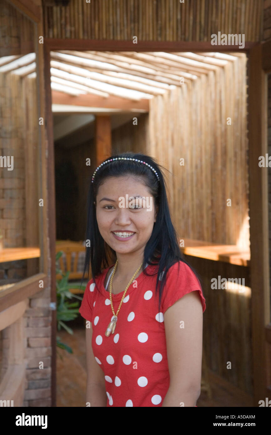 Female hotel worker at five star hotel posing in interior with