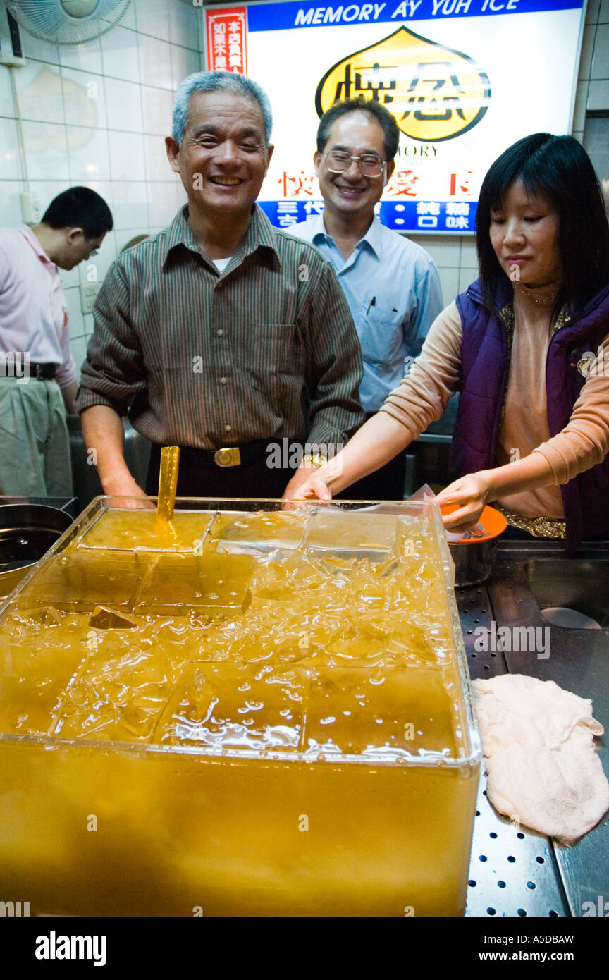 Stock photo of vendors selling jelly tea at the Snake Alley Night Market in Taipei Taiwan Stock Photo