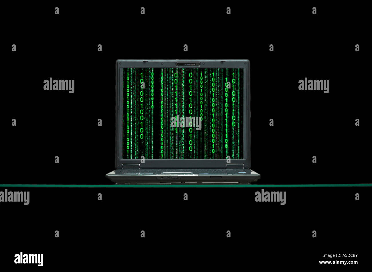 Laptop with binary code on computer monitor black background Stock Photo