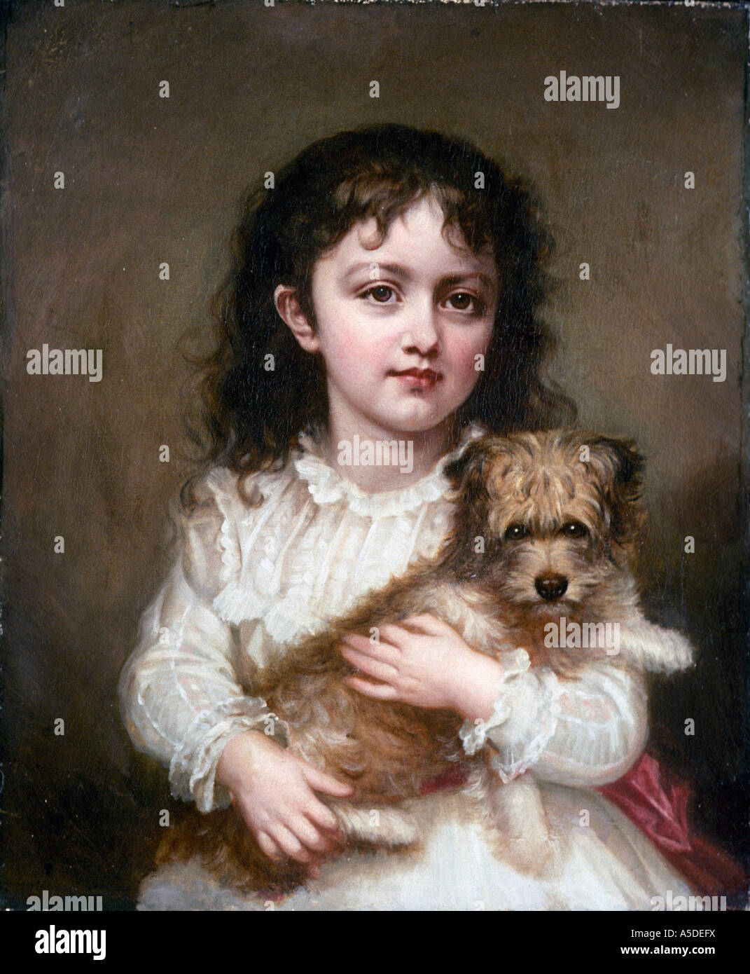 little boy holding dog painting