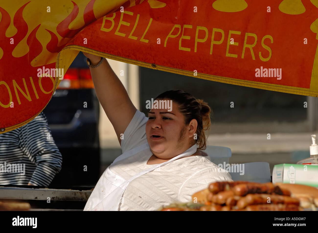 Food vendor female with facial hair Stock Photo Alamy