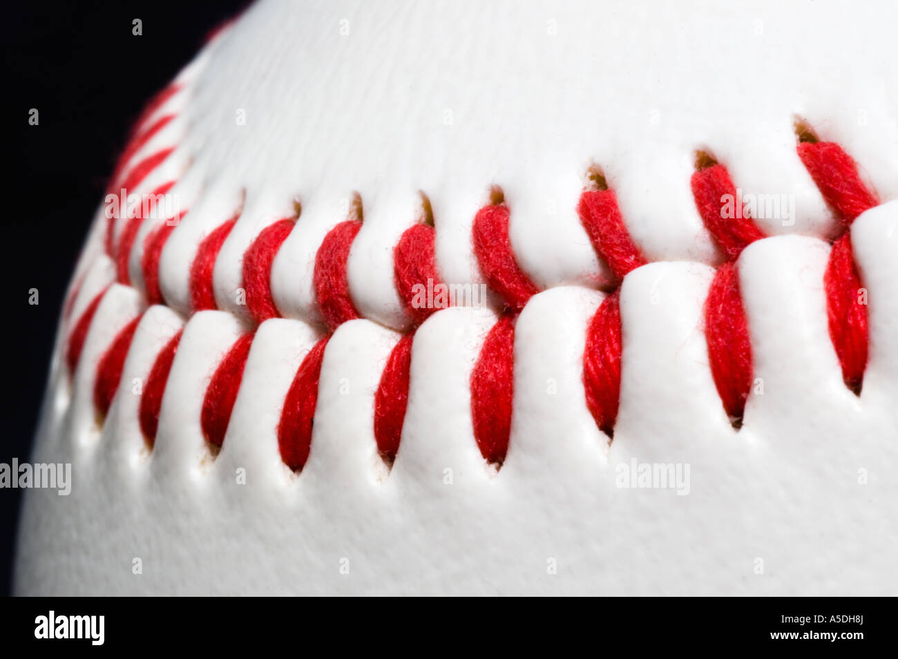 Close up stock photo of the seams on a baseball Stock Photo