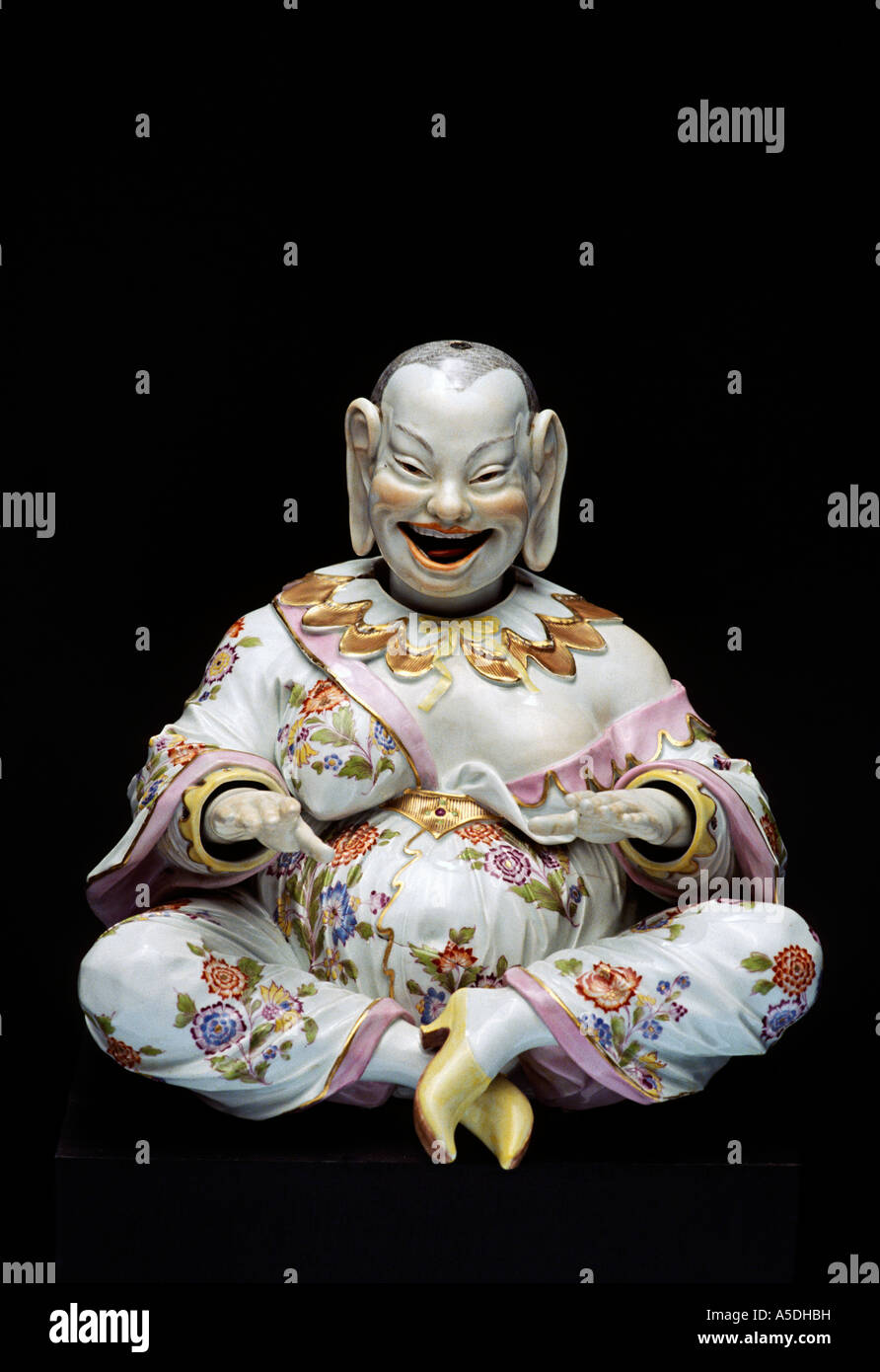 Ceramic laughing Buddha Stock Photo Alamy