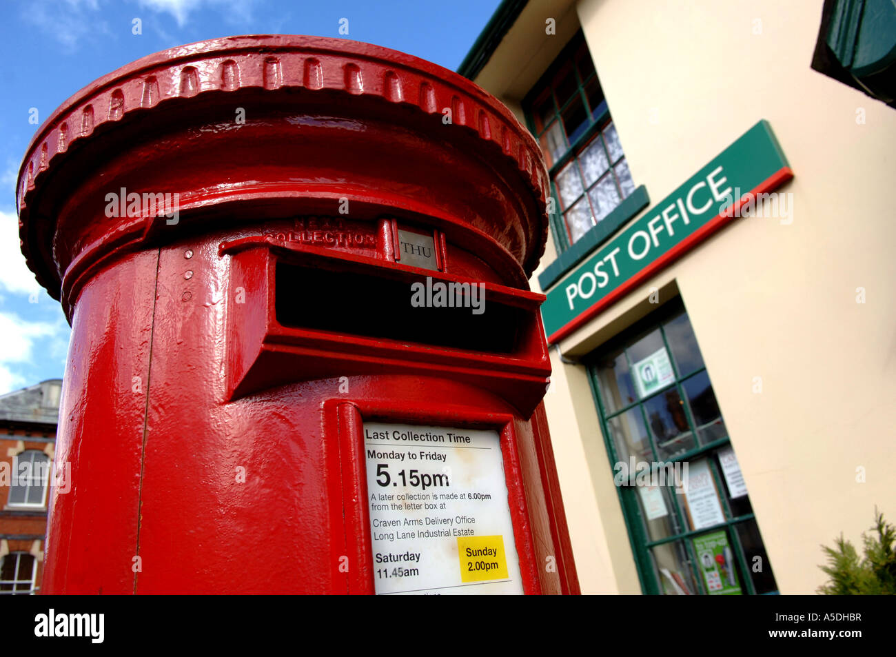 Post box at Post Office, High Street, Castle Shropshire UK
