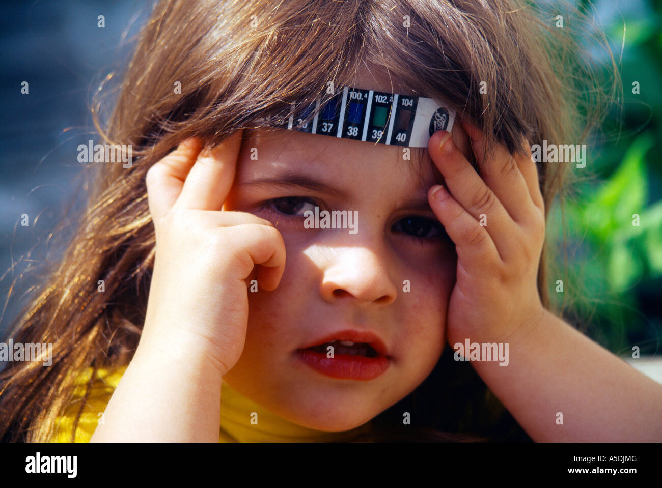 Thermo Strip On Child s Forehead Fever Stock Photo Alamy