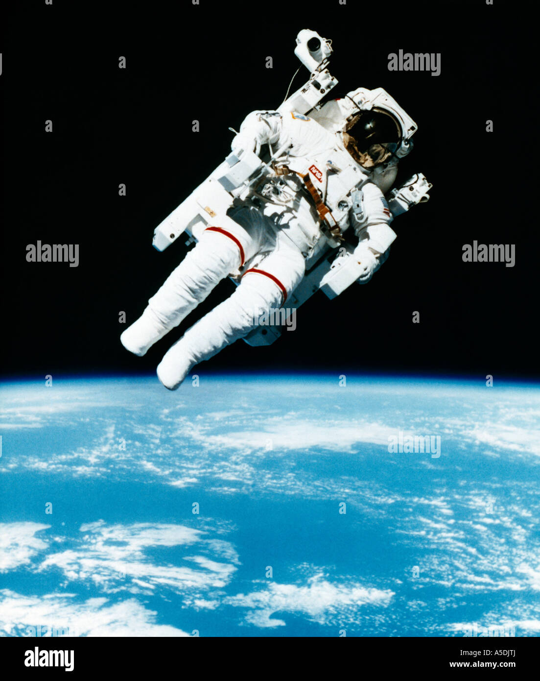 Astronaut  Bruce McCandless II in 1984 during the First Untethered Spacewalk by using the Manned Maneuvering Unit (MMU) Stock Photo