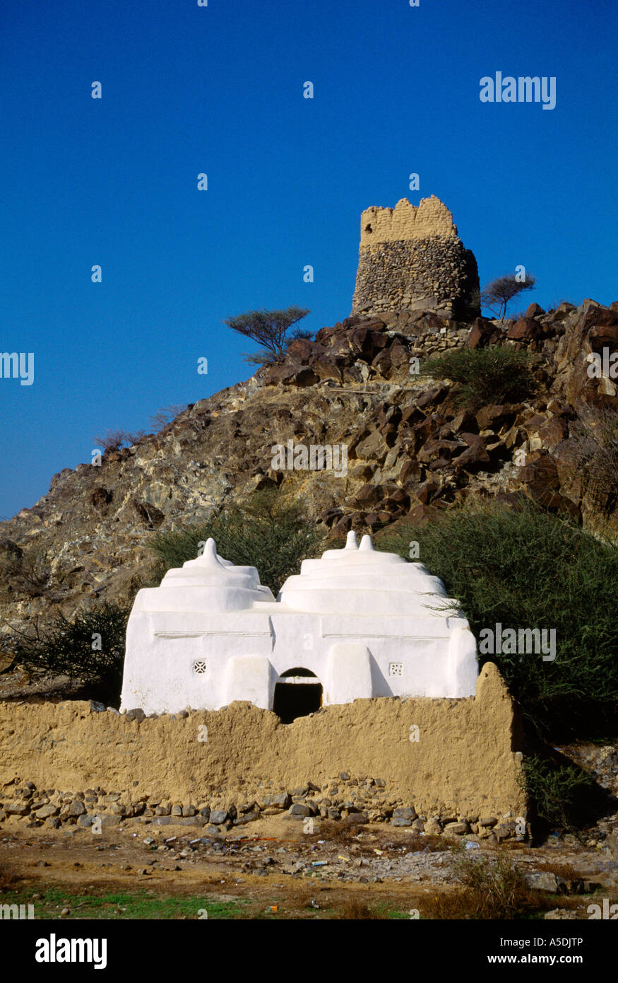 Fujairah UAE Al Bidyah Mosque 15th Century oldest working Mosque in the UAE with Four Dome Roof with Watchtower above Stock Photo