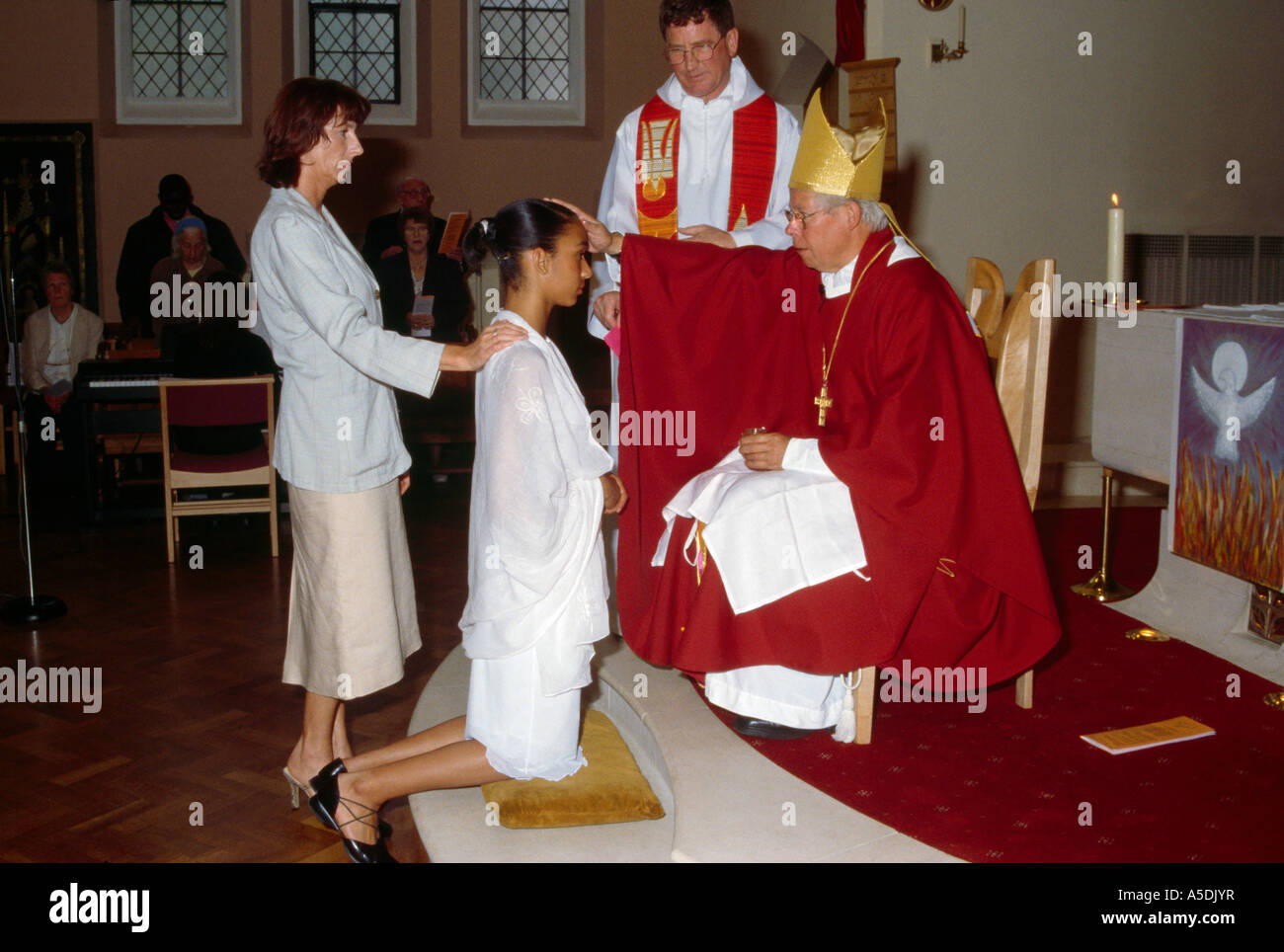 St Joseph's Catholic Church  Bishop & Candidate Confirmation At Pentecost Stock Photo