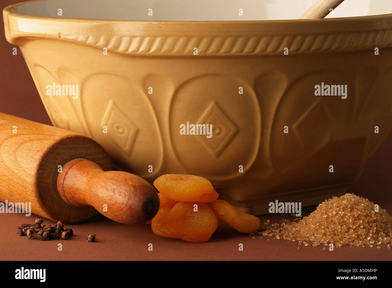 A Mixing Bowl, Rolling Pin and dried ingredients Stock Photo
