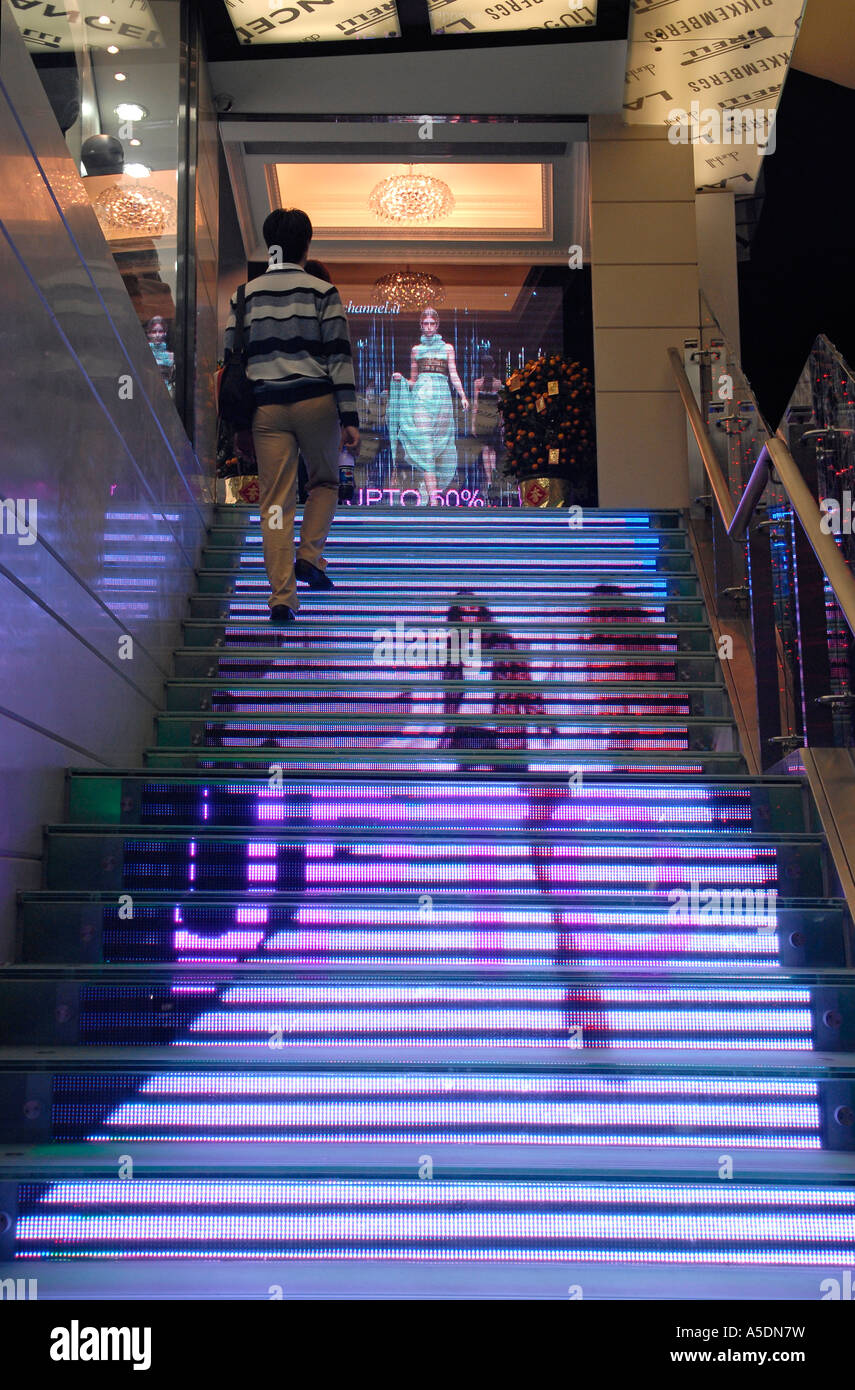 Customer entering a clothing store Hong Kong China Stock Photo Alamy