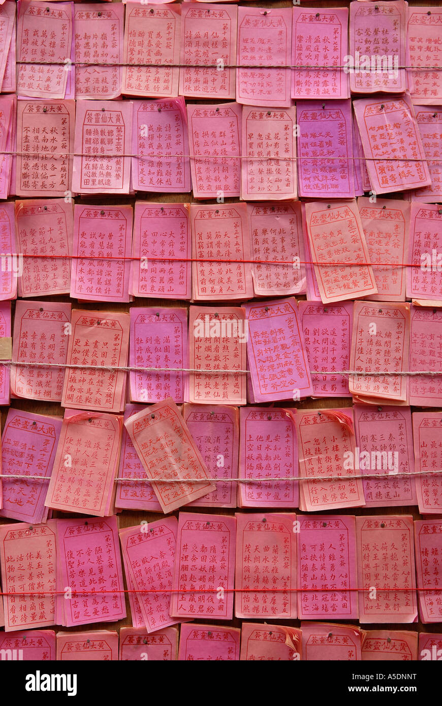 Prayers written on paper at Wong Tai Sin temple, Kowloon. Hong Kong,  China Stock Photo