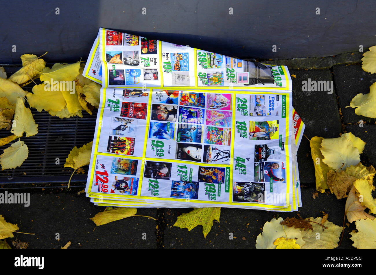 newspaper junk rubbish litter glossy magazine freebie throw away the