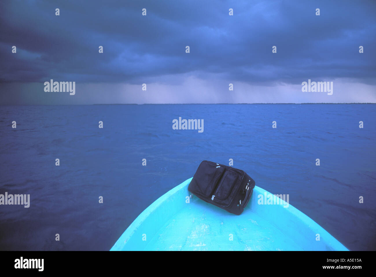 Travel suitcase on bow of boat Belize Central America Caribbean Stock Photo