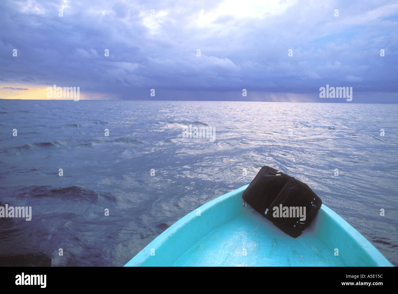 Travel suitcase on bow of boat Belize Central America Caribbean Stock Photo