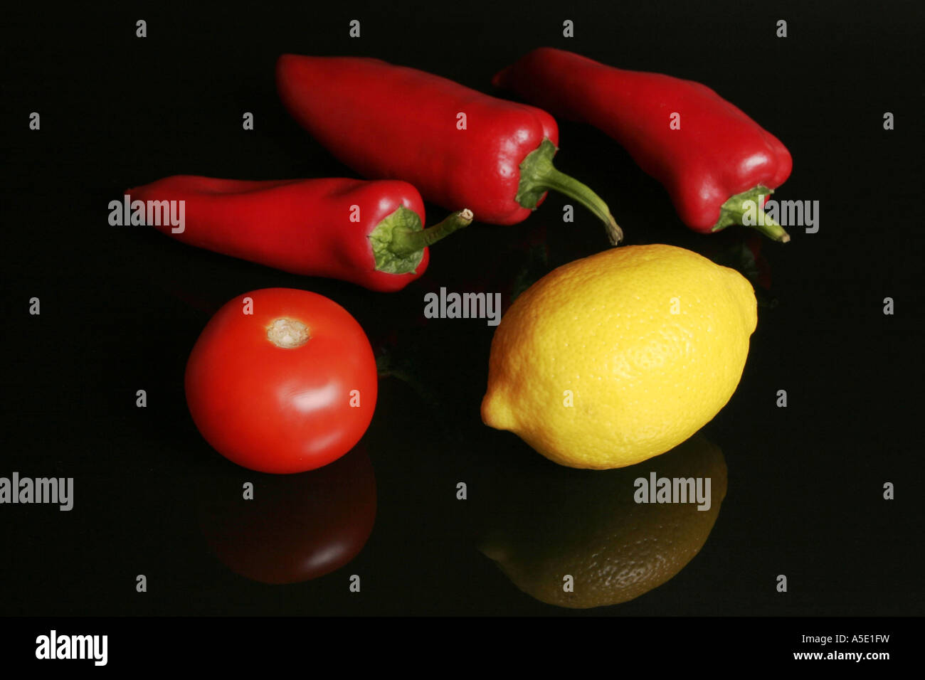 lemon, tomatoe and capsicum Stock Photo - Alamy