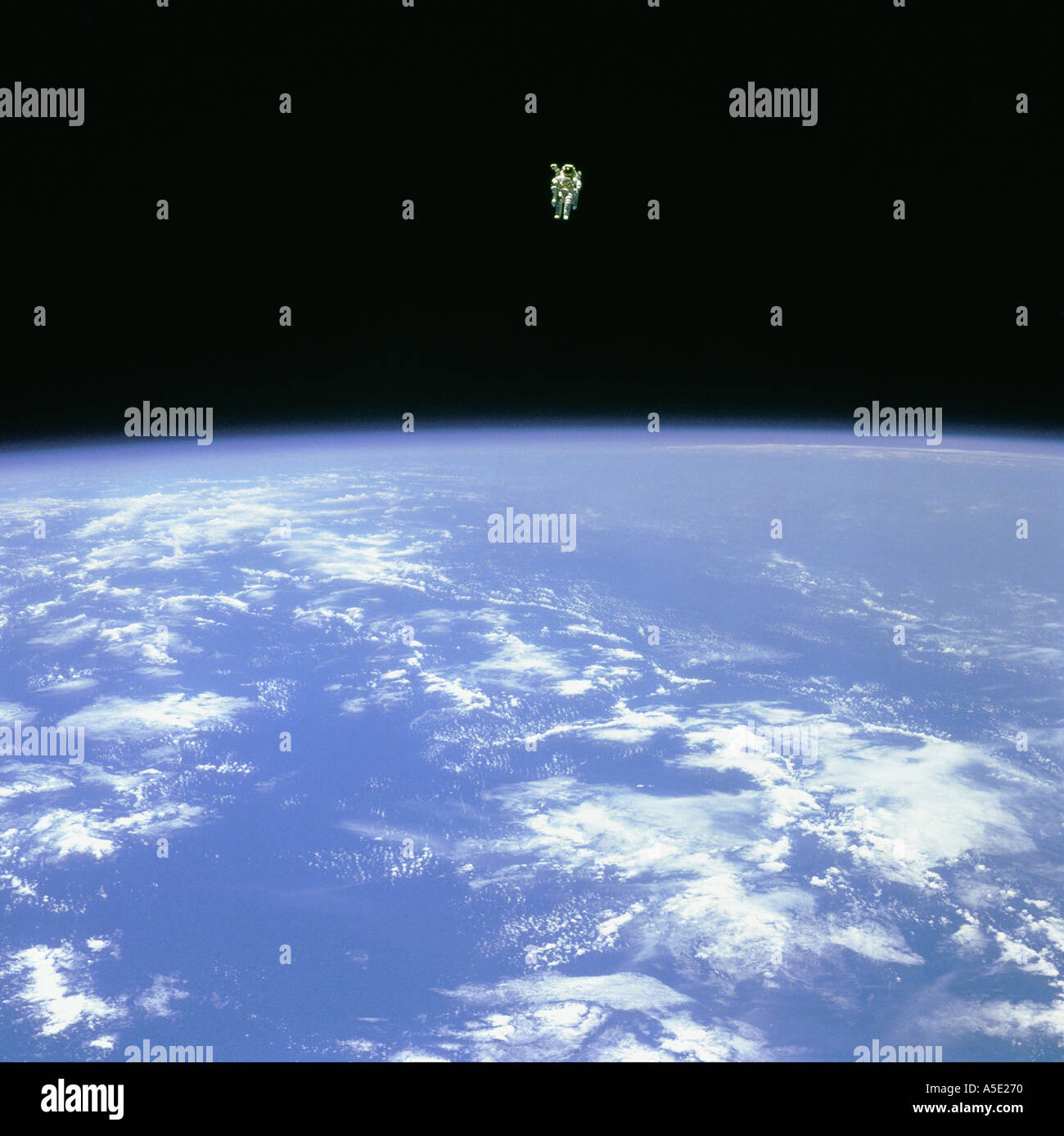 Spaceman floating in Space Earth from Space Stock Photo Alamy