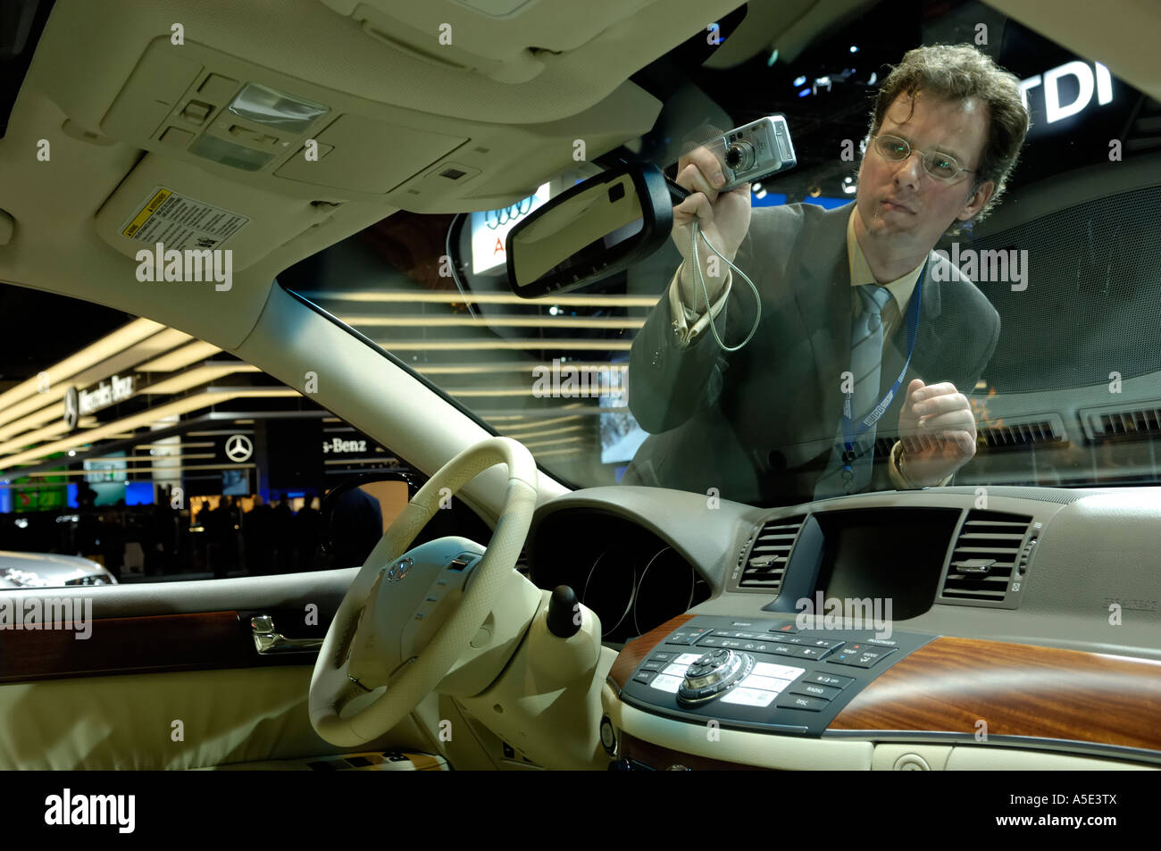 A Journalist Photographs The Interior Of The Infiniti M35x - 