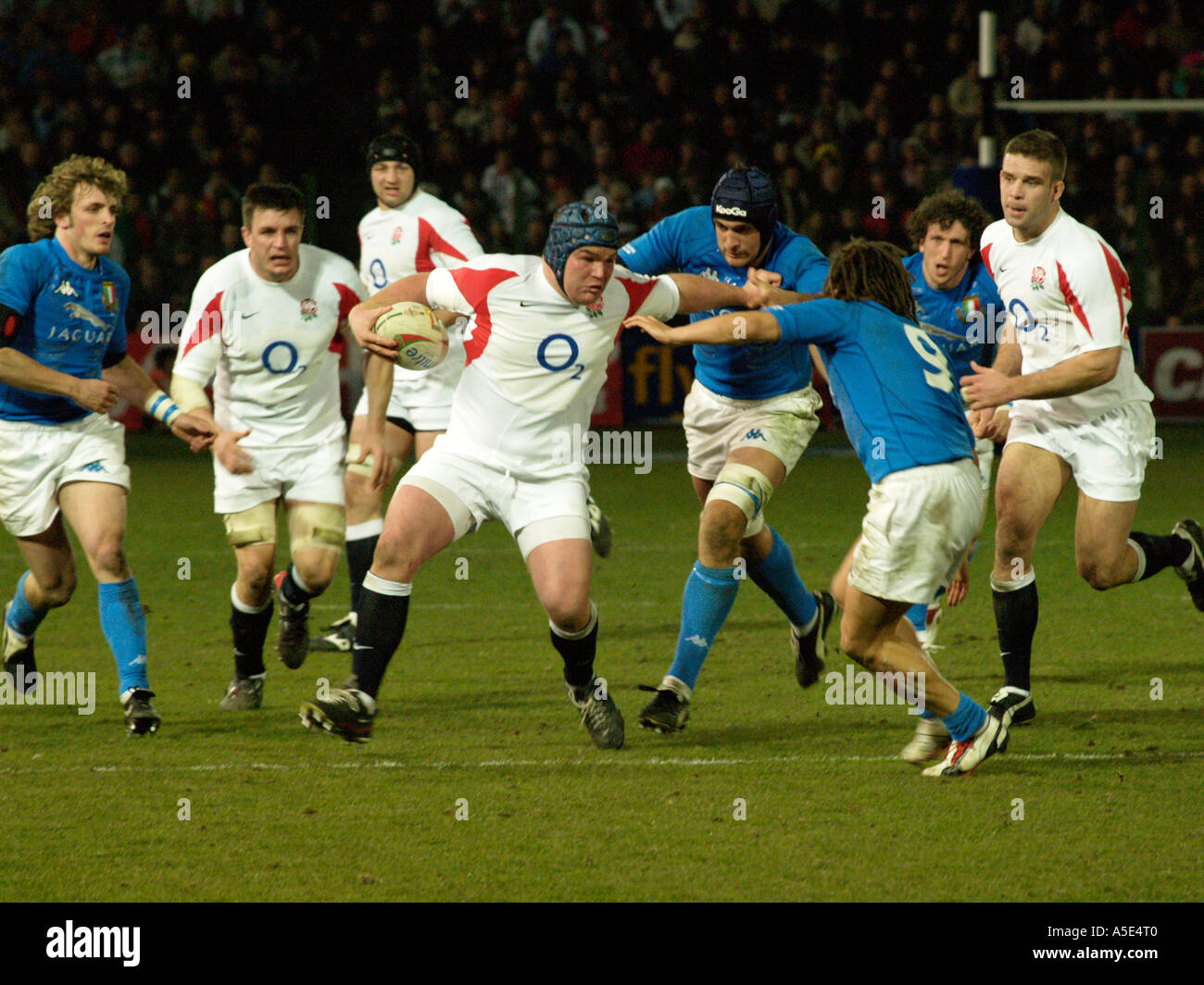 Matt Stevens fends off a challenge from Italian forward. Italy v England 11 Feb 2006 six 6 nations rugby Stock Photo