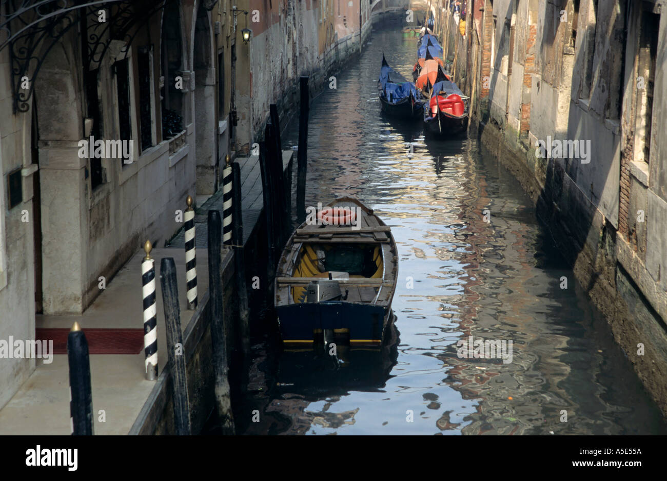 Gondolas on a narrow canal venice hi-res stock photography and images ...