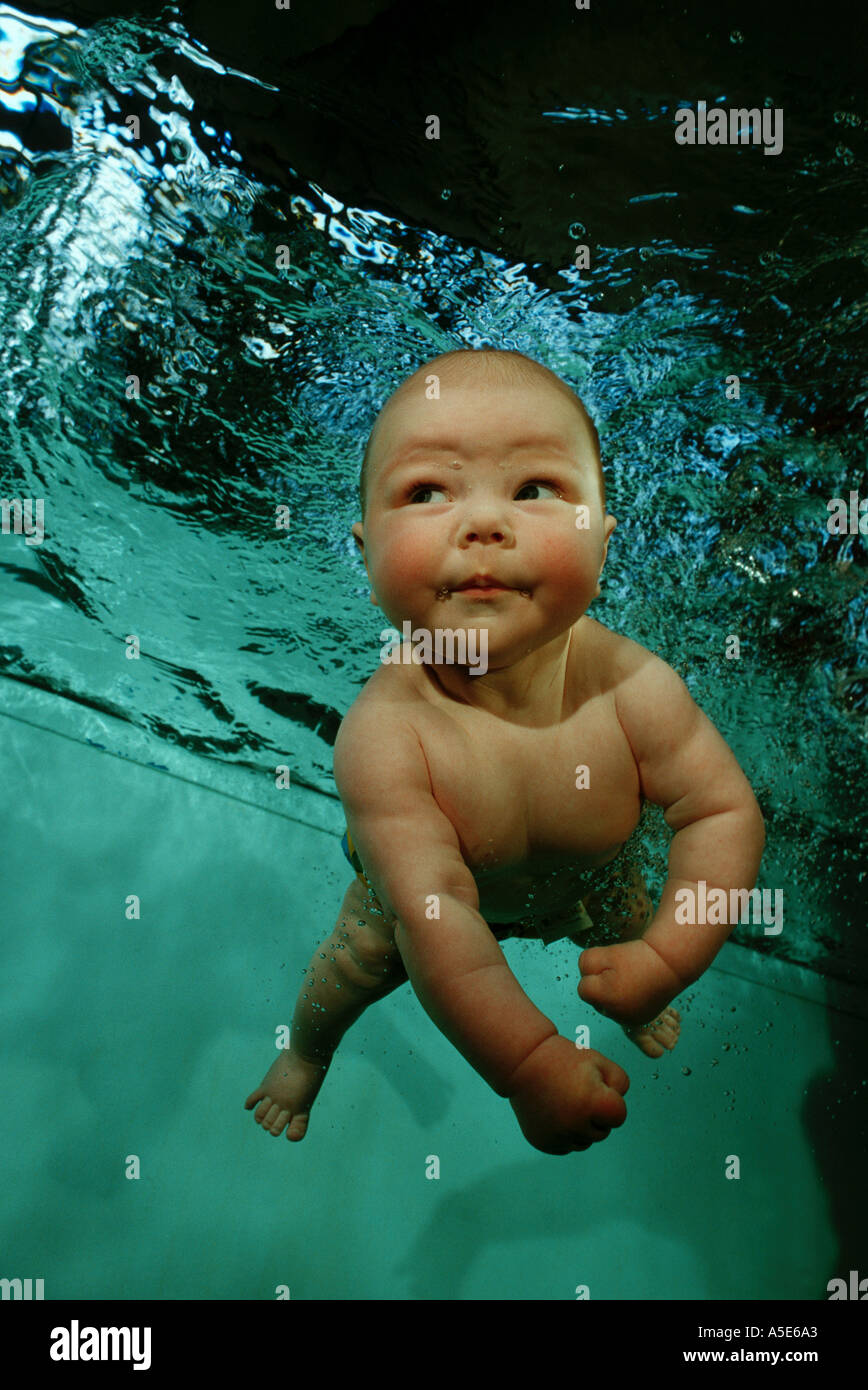 baby diving in a pool Stock Photo Alamy