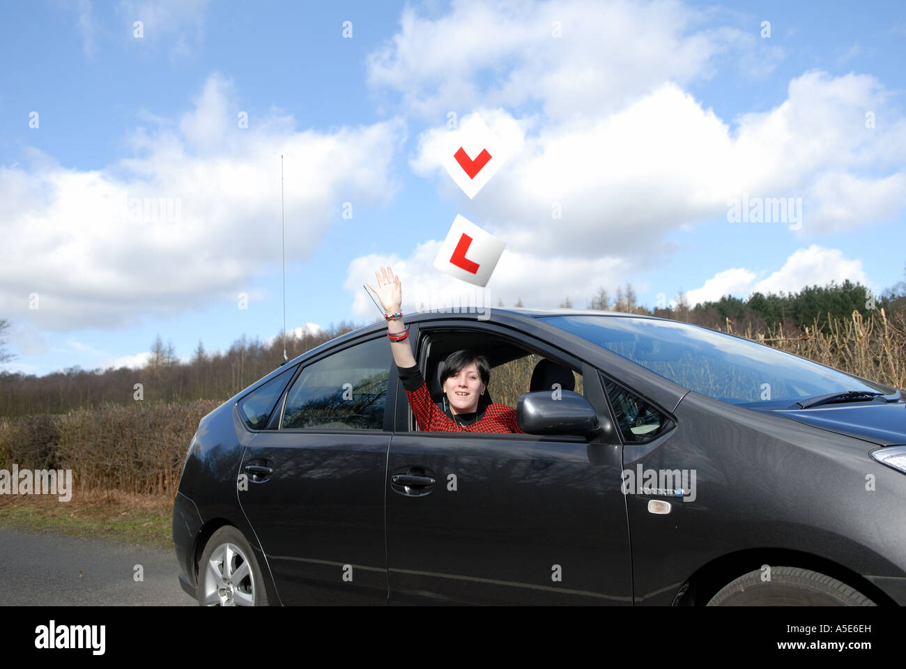 Teenage Girl Passing Driving Test. Stock Photo