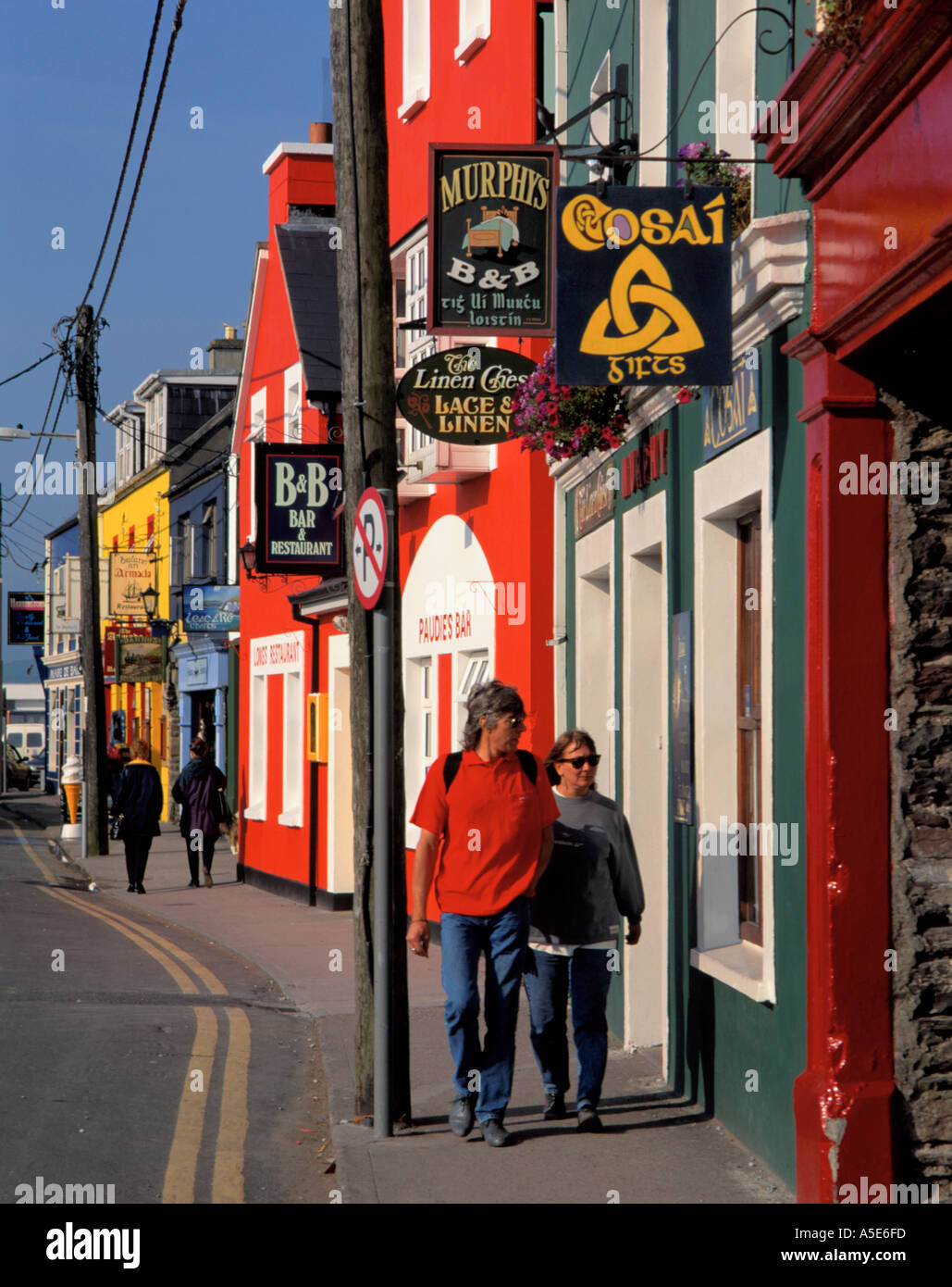 Brightly painted buildings, Dingle village, Dingle Peninsula, County Kerry, Eire (Ireland). Stock Photo