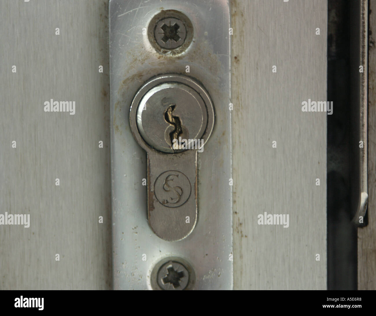Door key snapped off in lock due to metal fatigue Stock Photo Alamy