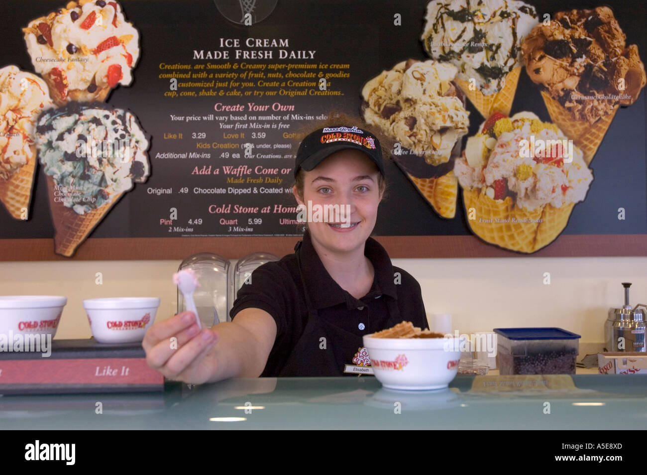 Cold Stone Creamery Employee Offers Ice Cream Sample 2 Mr Stock Photo Alamy