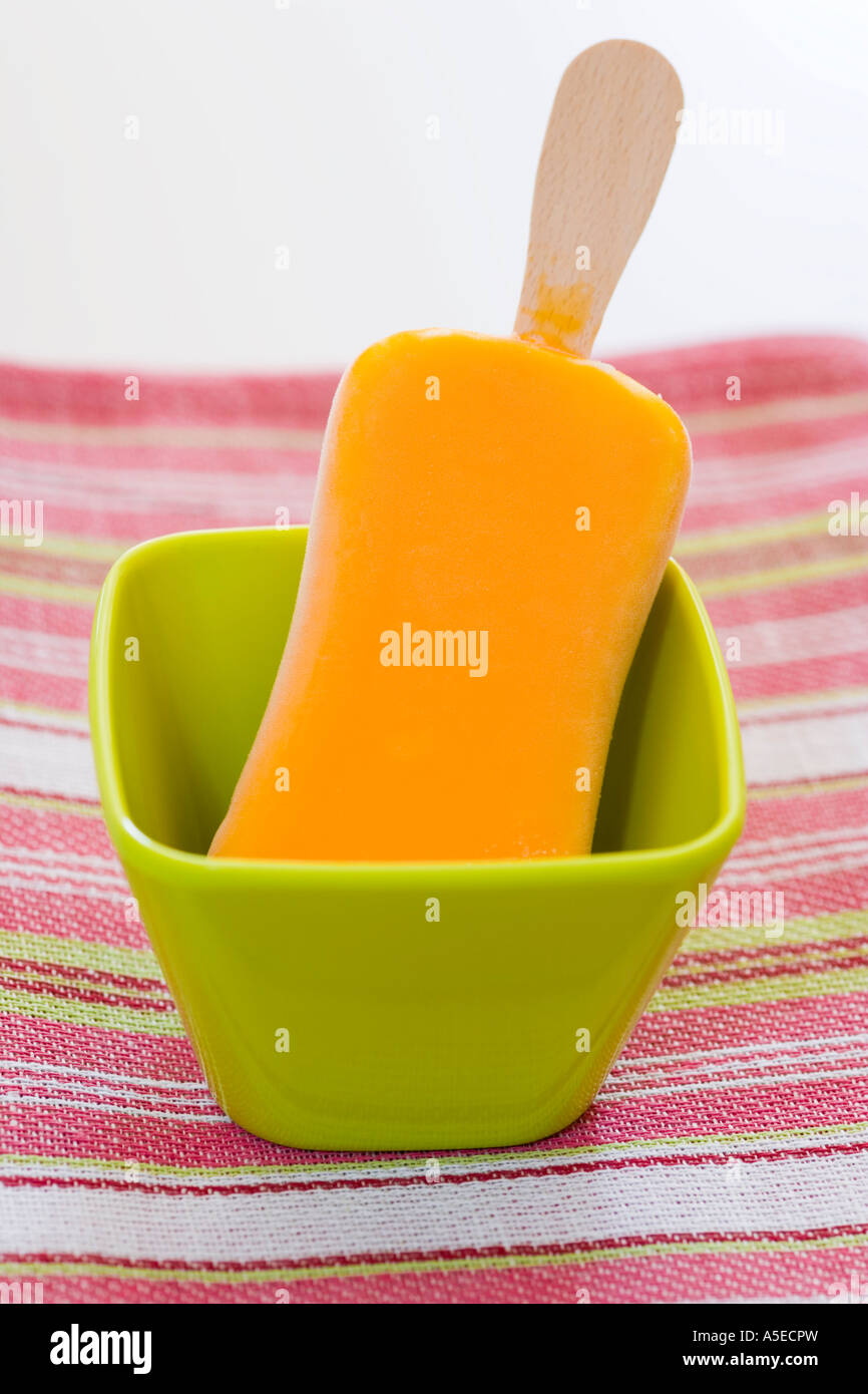 Icedlolly in green plastic bowl Stock Photo Alamy