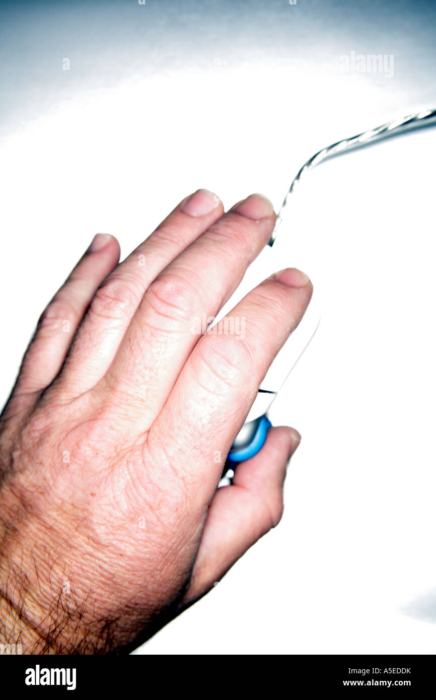 Hand on ergonomic computer mouse Stock Photo - Alamy