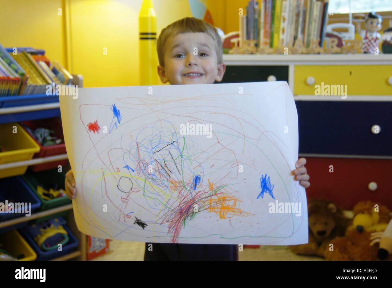 3 year old's drawing holding Stock Photo Alamy