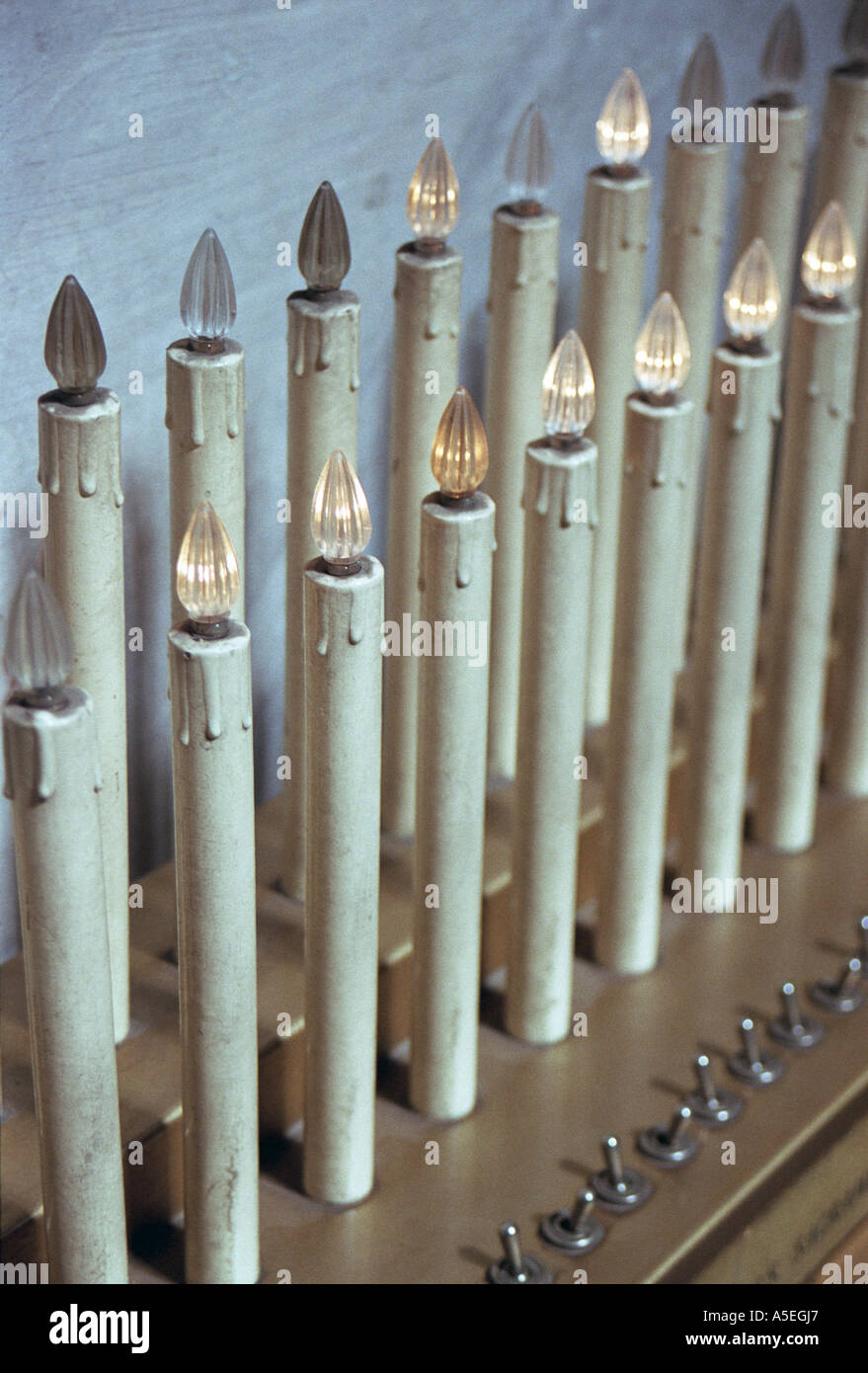 plastic candles in church Stock Photo Alamy