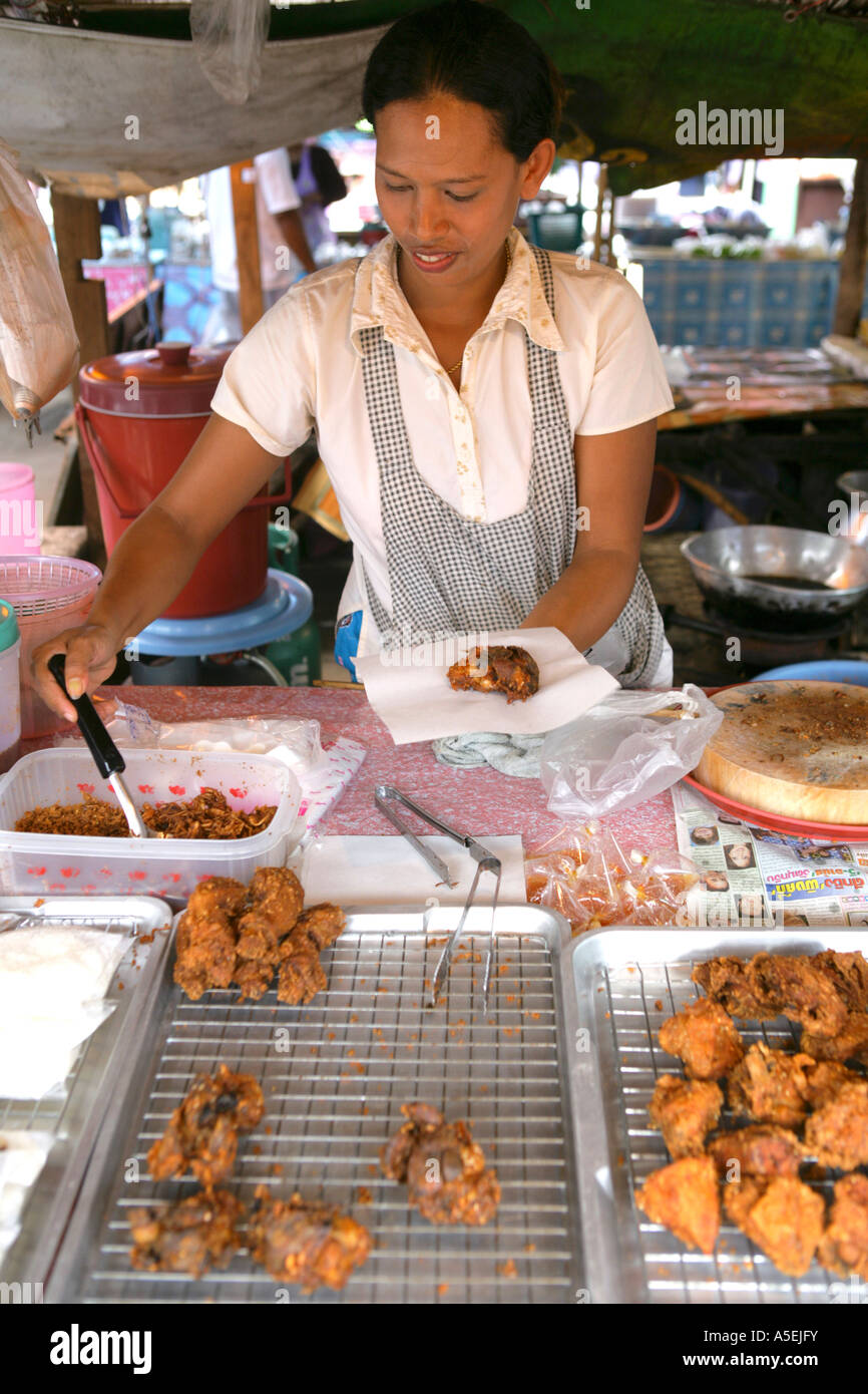 woman sales thai food on market in Thailand Stock Photo