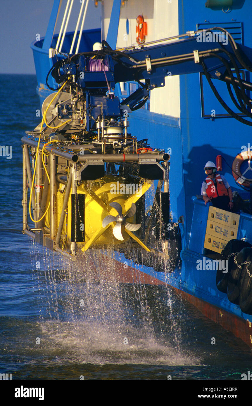 Autonomous Underwater Vehicle (AUV) reboarding a survey boat following its 3 D seismic survey studies in the Gulf of Mexico. Stock Photo