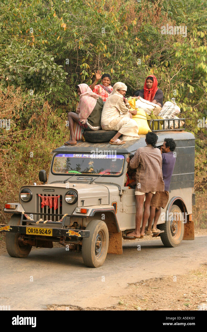 Desia Kondh tribal people load on a jeep for their weekly market near Rayagada Orissa Stock Photo