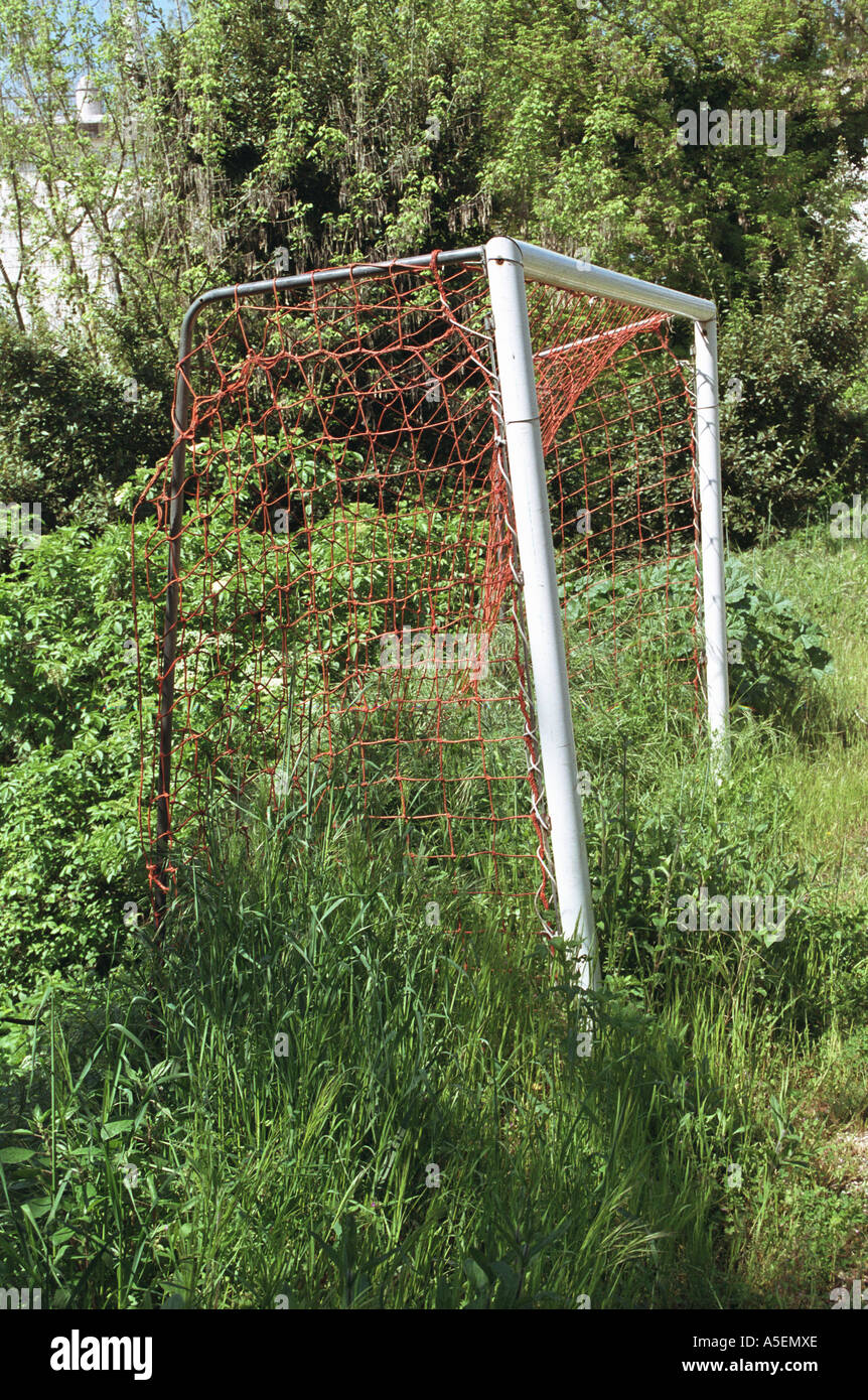 soccer goalposts in undergrowth Stock Photo Alamy